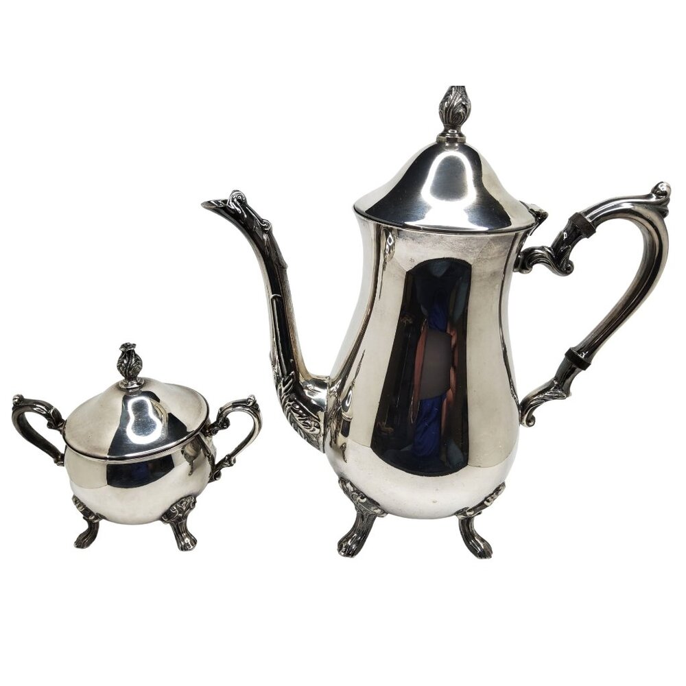vintage pair of silver plate tea pot with sugar bowl.